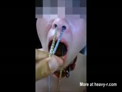 Whore got metal strings full of shit inside her mouth
